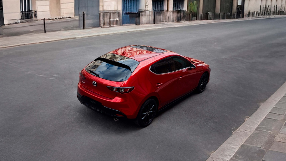 2026 MAZDA3 hatchback driving on street