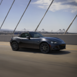 2026 MAZDA MX-5 Miata driving on a bridge